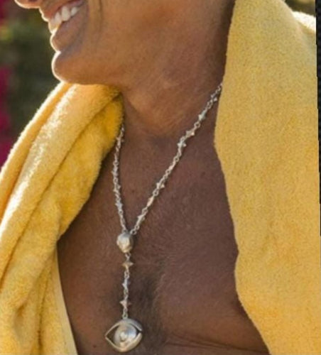 Collier oeil tete de mort en argent
