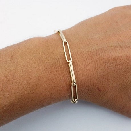 bracelet menotte or 18 carats et mailles rectangle