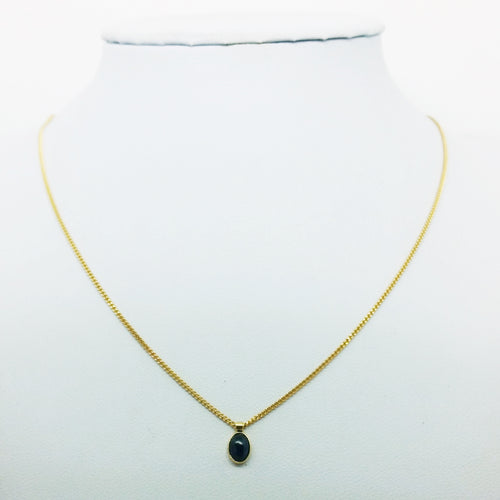 Collier or et saphir
