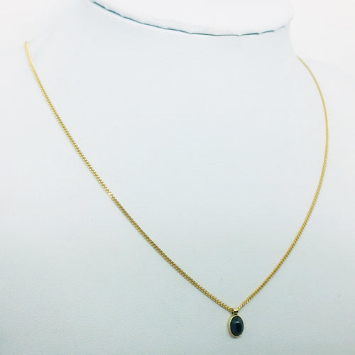 Collier or et saphir