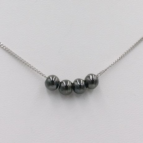 Collier avec perles en or noir