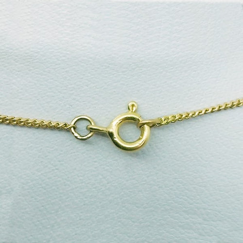 Collier or et saphir