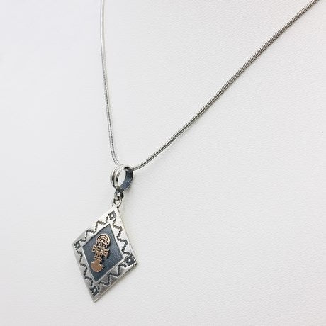 pendentif tumi argent